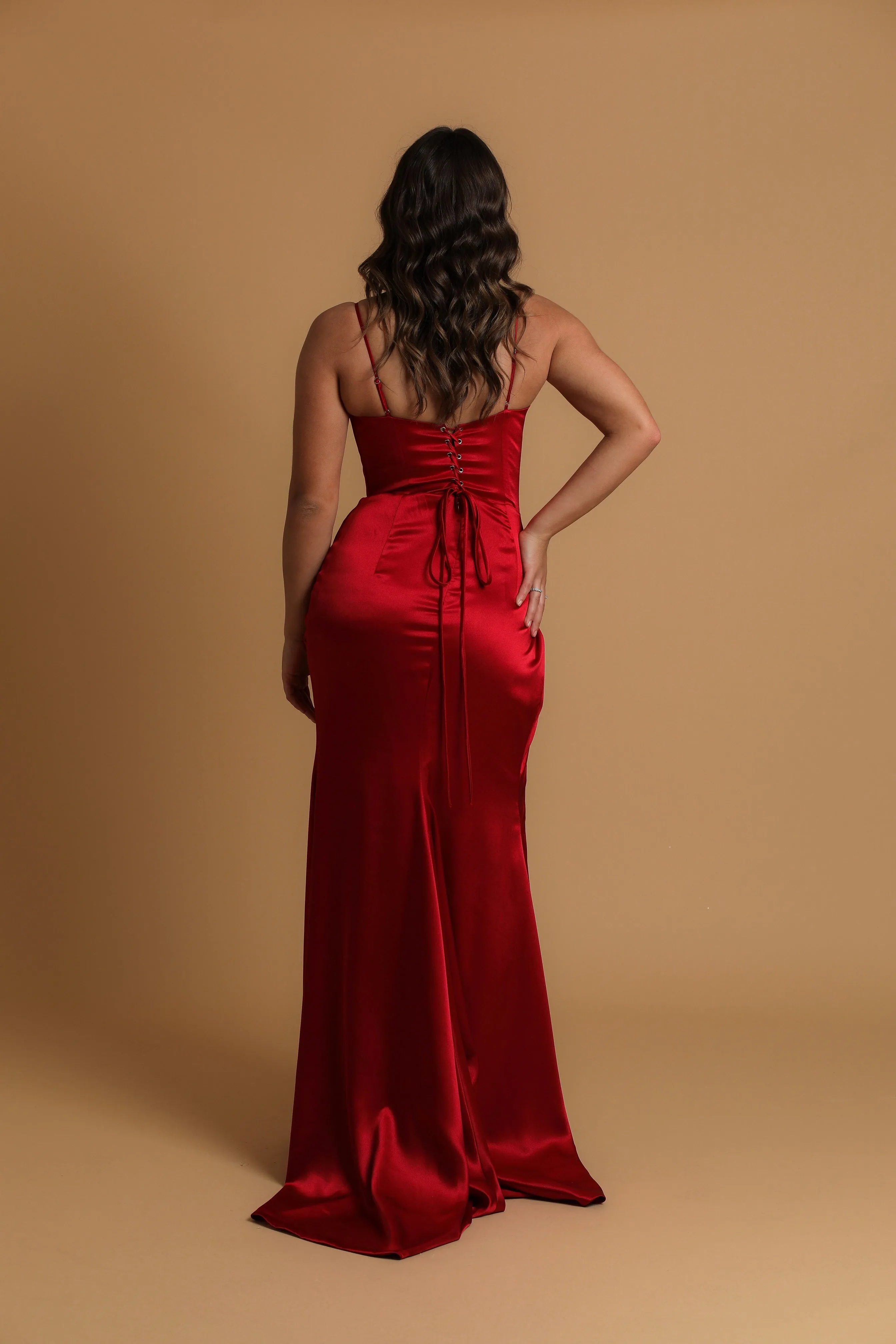 Red satin column shaped dress with v neckline